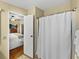 Shared bathroom with shower and access to bedroom at 35921 Hermoso Ln, Zephyrhills, FL 33541
