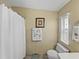 Bathroom with shower/tub combo and updated vanity at 35921 Hermoso Ln, Zephyrhills, FL 33541