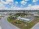 Aerial view of community pool, clubhouse, shuffleboard at 35921 Hermoso Ln, Zephyrhills, FL 33541