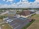 Aerial view of community clubhouse and parking lot at 35921 Hermoso Ln, Zephyrhills, FL 33541