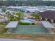 Aerial view of community amenities including pool, shuffleboard, and covered seating at 35921 Hermoso Ln, Zephyrhills, FL 33541