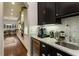 Convenient kitchen coffee bar with marble countertop and built-in mini-fridge at 3608 W Horatio St, Tampa, FL 33609