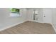 Spacious bedroom with vinyl flooring and en-suite bathroom at 3909 W La Salle St, Tampa, FL 33607