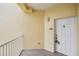 Condo unit entryway with white door and balcony at 425 150Th Ave # 2401, Madeira Beach, FL 33708