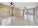 Spacious living room with tile floors and water views at 425 150Th Ave # 2401, Madeira Beach, FL 33708