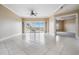 Spacious living room with tile floors and water views at 425 150Th Ave # 2401, Madeira Beach, FL 33708