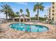 Community pool and spa area at 425 150Th Ave # 2401, Madeira Beach, FL 33708