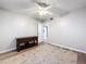 Bedroom featuring a ceiling fan, wood-look floors, and console table at 4507 S Oak Dr # P71, Tampa, FL 33611