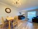 Bright dining area with four-chair table, near living room at 4507 S Oak Dr # P71, Tampa, FL 33611