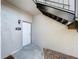 Condo entry with white door and black metal stairs at 4507 S Oak Dr # P71, Tampa, FL 33611