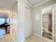Condo hallway with linen closet and bathroom access at 4507 S Oak Dr # P71, Tampa, FL 33611