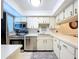 Small condo kitchen with stainless steel appliances at 4507 S Oak Dr # P71, Tampa, FL 33611