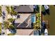 Aerial view of a house with a pool and private dock at 5606 Seagrass Pl, Apollo Beach, FL 33572
