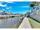 Private dock with boat lift and walkway at 5606 Seagrass Pl, Apollo Beach, FL 33572