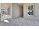 Bright and airy front entryway with a view into the home's interior at 5606 Seagrass Pl, Apollo Beach, FL 33572