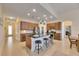 Spacious open kitchen with a large center island, stainless steel appliances, and ample counter space at 5606 Seagrass Pl, Apollo Beach, FL 33572