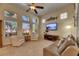 Relaxing living room with comfortable seating and a large TV at 5606 Seagrass Pl, Apollo Beach, FL 33572