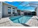 Refreshing screened pool, ideal for enjoying Florida sunshine at 5606 Seagrass Pl, Apollo Beach, FL 33572