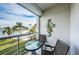 Enjoy water views from this balcony, featuring a table and chairs at 5901 Bahia Del Mar Cir # 321, St Petersburg, FL 33715