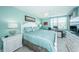 Spacious bedroom with a comfy bed and built-in desk at 5901 Bahia Del Mar Cir # 321, St Petersburg, FL 33715