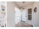 Condo entry with white door and security screen at 5901 Bahia Del Mar Cir # 321, St Petersburg, FL 33715