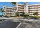 Building exterior showcasing the entrance and parking at 5901 Bahia Del Mar Cir # 321, St Petersburg, FL 33715