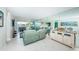 Bright living room with tile floors and mirrored wall at 5901 Bahia Del Mar Cir # 321, St Petersburg, FL 33715