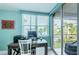Home office with a desk and balcony access at 5901 Bahia Del Mar Cir # 321, St Petersburg, FL 33715