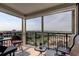 Spacious balcony with wicker furniture and stunning golf course views at 6372 Palma Del Mar S Blvd # 905, St Petersburg, FL 33715