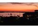 Stunning waterfront view at sunset, showcasing boats and cityscape at 6372 Palma Del Mar S Blvd # 905, St Petersburg, FL 33715