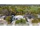 Aerial view of single-Gathering home on golf course lot with pool at 638 Mehlenbacher Rd, Belleair, FL 33756
