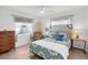Charming bedroom with unique wall design and sitting area at 638 Mehlenbacher Rd, Belleair, FL 33756