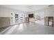 Room with new flooring and large window, currently under construction at 65 Dolphin Dr, Treasure Island, FL 33706