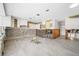 Under construction kitchen with new flooring and partially installed cabinets at 65 Dolphin Dr, Treasure Island, FL 33706