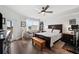 Spacious main bedroom with king-size bed and access to balcony at 960 Starkey Rd # 7101, Largo, FL 33771