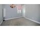Spacious bedroom with neutral walls and carpeting at 11910 Climbing Fern Ave, Riverview, FL 33579