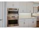 Built-in double oven and microwave in a modern kitchen at 11910 Climbing Fern Ave, Riverview, FL 33579