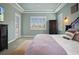 Serene main bedroom with sliding glass doors to the pool area at 11910 Climbing Fern Ave, Riverview, FL 33579