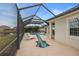 Relaxing pool and spa with covered patio at 11910 Climbing Fern Ave, Riverview, FL 33579
