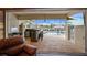 Relaxing view of the pool and patio from an indoor lounge area at 11910 Climbing Fern Ave, Riverview, FL 33579