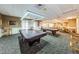 Relaxing game room with billiard tables for entertainment at 1215 Dustan Pl, Trinity, FL 34655
