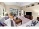 Open living room featuring a view of the back patio and sliding glass doors at 1215 Dustan Pl, Trinity, FL 34655