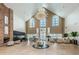 Elegant lobby with high ceilings, chandelier, fireplace, and seating at 1215 Dustan Pl, Trinity, FL 34655