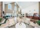 Spacious lobby with high ceilings, chandelier, and comfortable seating at 1215 Dustan Pl, Trinity, FL 34655