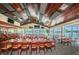 Community restaurant with a bar, large windows, and lake views at 1215 Dustan Pl, Trinity, FL 34655