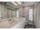Double vanity bathroom with updated fixtures at 12430 81St Pl, Seminole, FL 33772