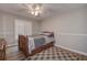 Bedroom with wood flooring and a ceiling fan at 12430 81St Pl, Seminole, FL 33772