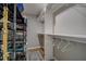 Walk-in closet with shelving and hanging rods at 12430 81St Pl, Seminole, FL 33772