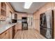 Modern kitchen featuring granite countertops and stainless steel appliances at 12430 81St Pl, Seminole, FL 33772