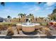 Attractive community entrance with fountain and landscaping at 1308 Alhambra Dr, Apollo Beach, FL 33572